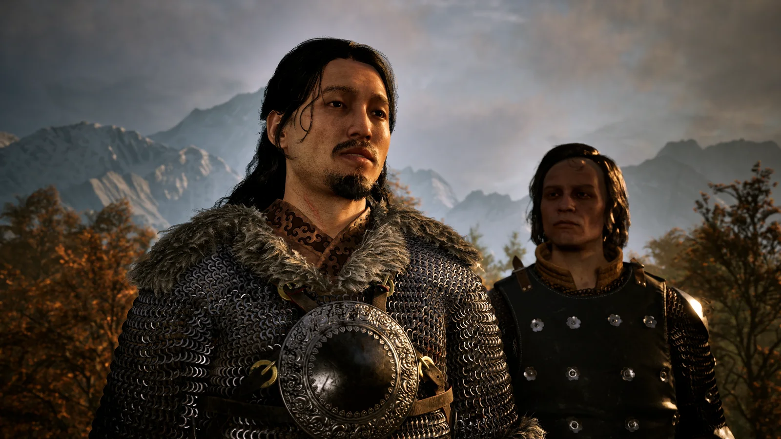Marat stands in armor before the mountains of Vale Sangora